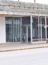 The front window of the Millinocket Cultural Center, displaying all the work done to date.
